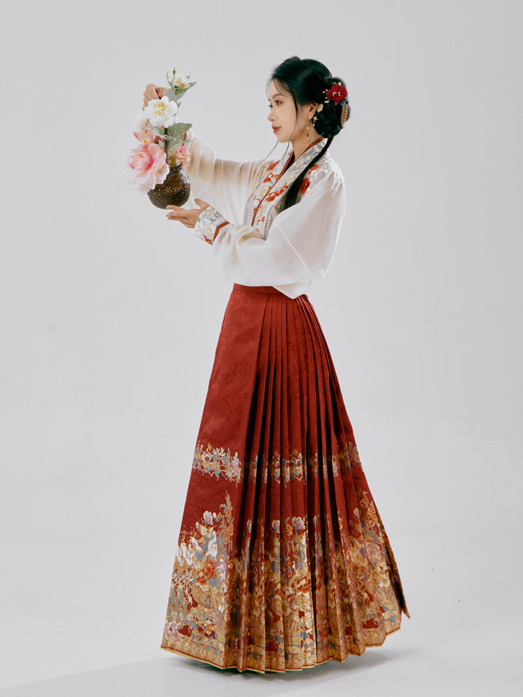 Luxurious Hanfu dress with gold-thread embroidery depicting seasonal flowers, combining Ming dynasty elements with contemporary styling