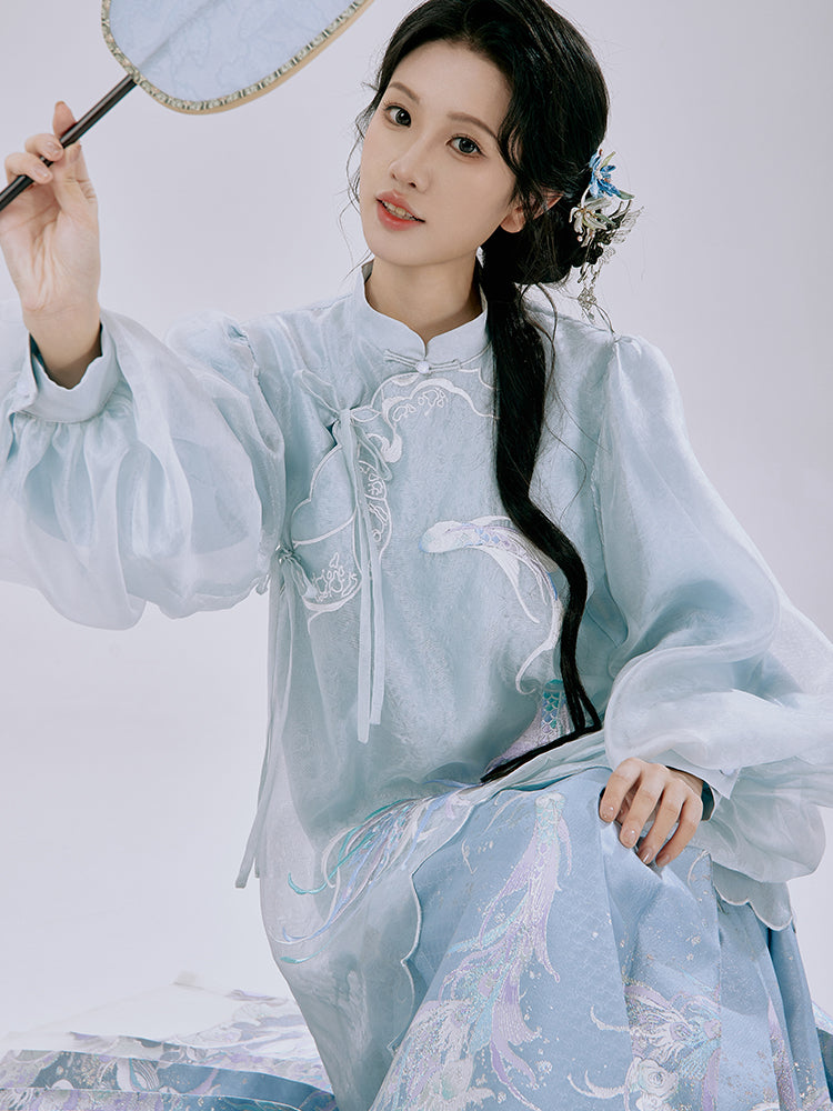 Back view of Ethereal Koi Hanfu Set displaying the traditional horse-face skirt silhouette and mist-like layered upper garment inspired by Song Dynasty clothing.